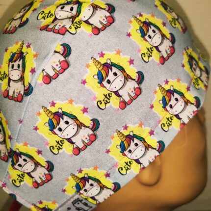 Touca cirúrgica cartoons fita. Póneis.