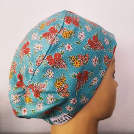 Touca cirúrgica floral elástico.