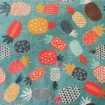 Individual resinado com laranja.